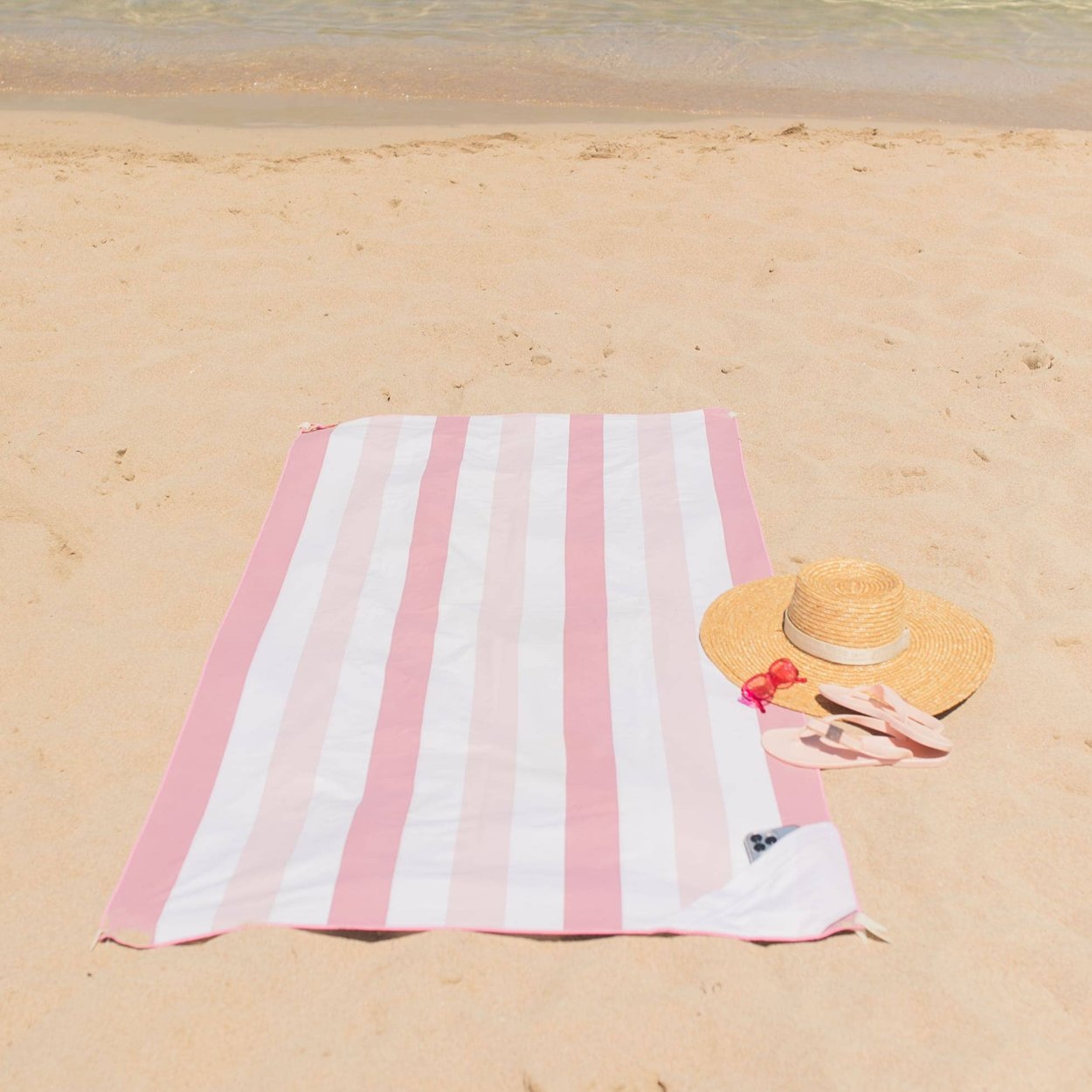 Roze gestreepte strandhanddoek Sydney